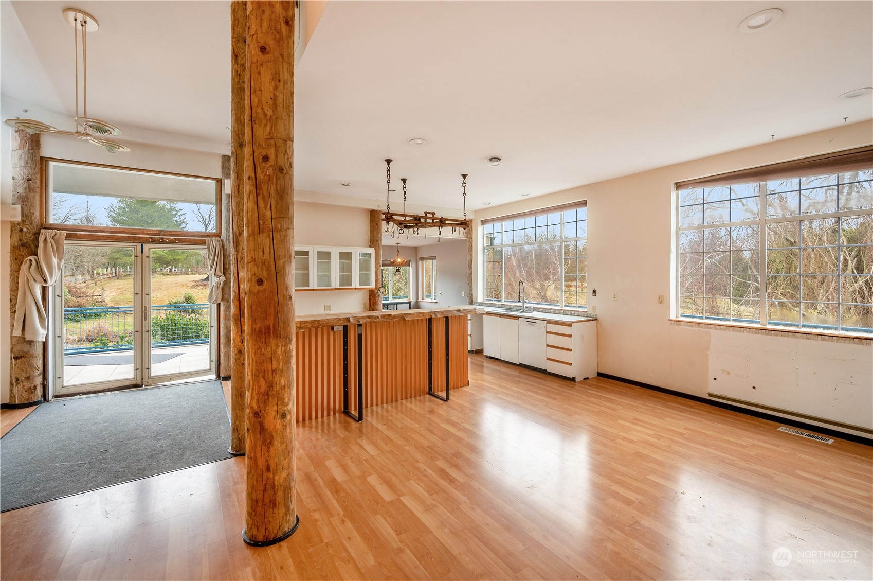 1848 Kelly Road Bellingham, WA 98226 - Photo 8 of 39 a view of a living room with furniture and a floor to ceiling window