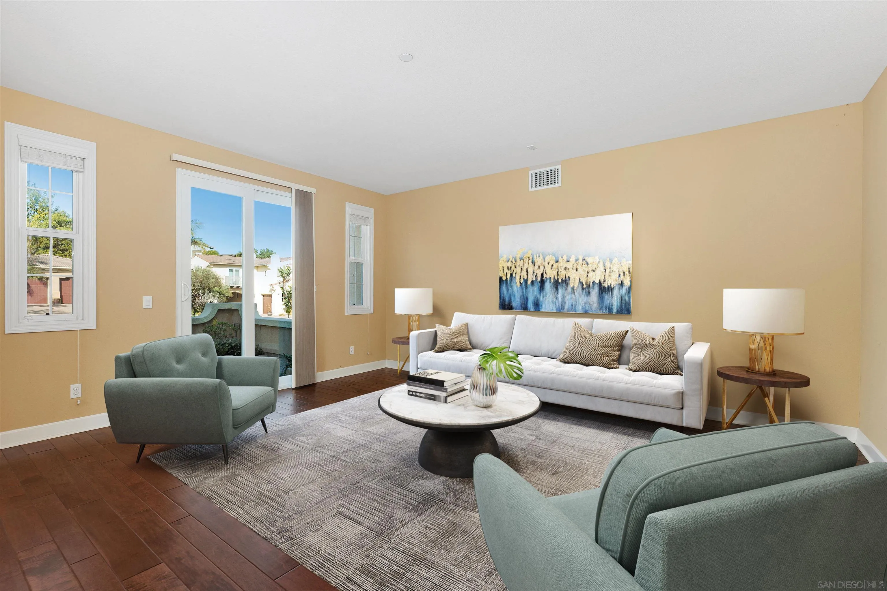 527 Quail Pointe Lane Encinitas, CA 92024 - Photo 14 of 46 a living room with furniture and a wooden floor