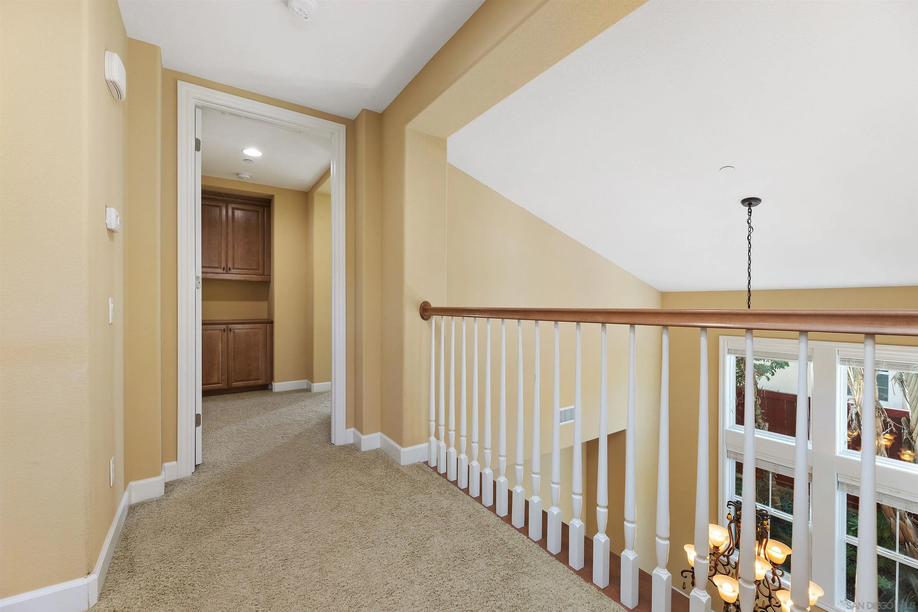527 Quail Pointe Lane Encinitas, CA 92024 - Photo 25 of 46 a view of a hallway view with staircase
