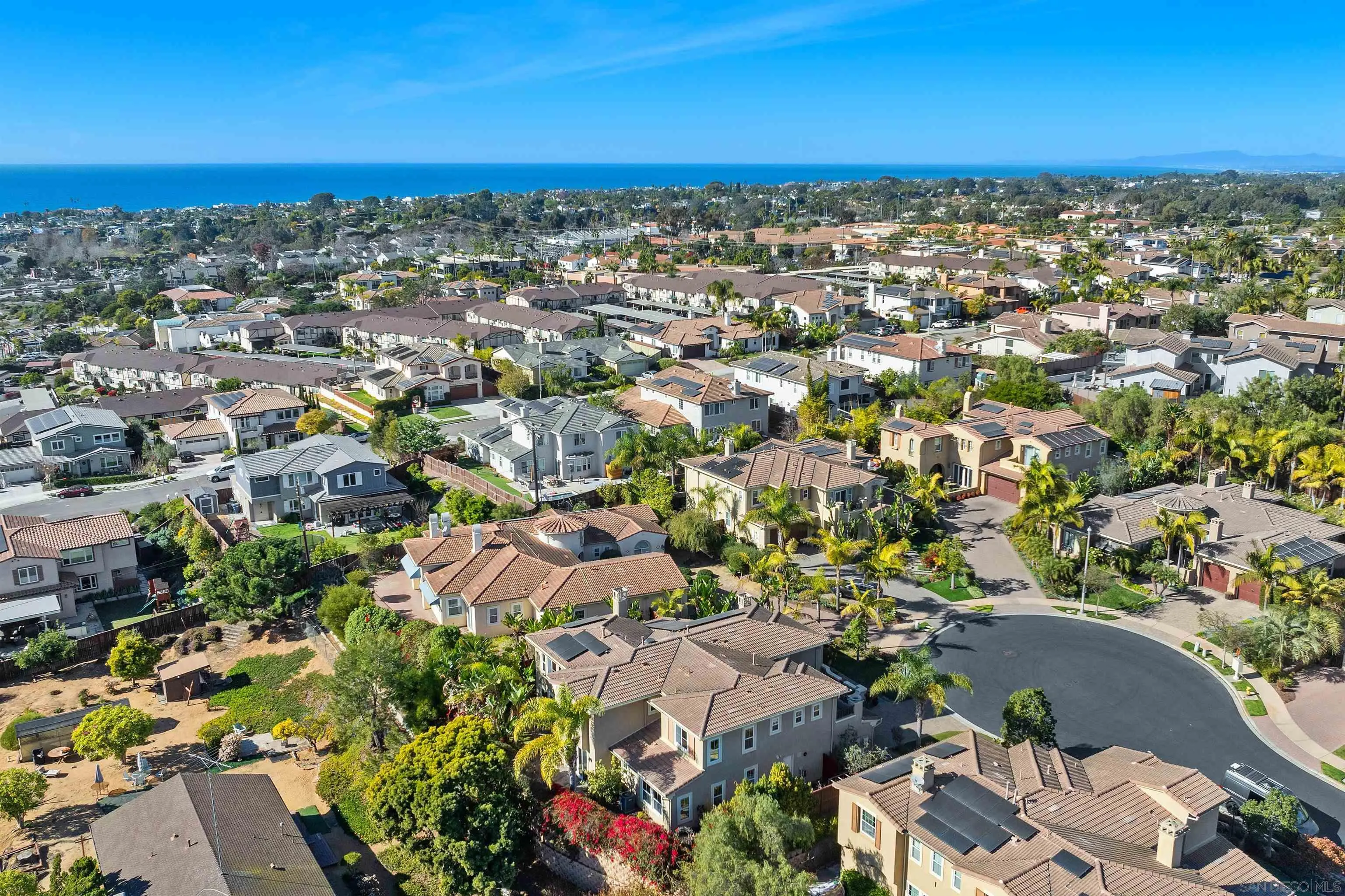 527 Quail Pointe Lane Encinitas, CA 92024 - Photo 3 of 46 an aerial view of residential building with green space