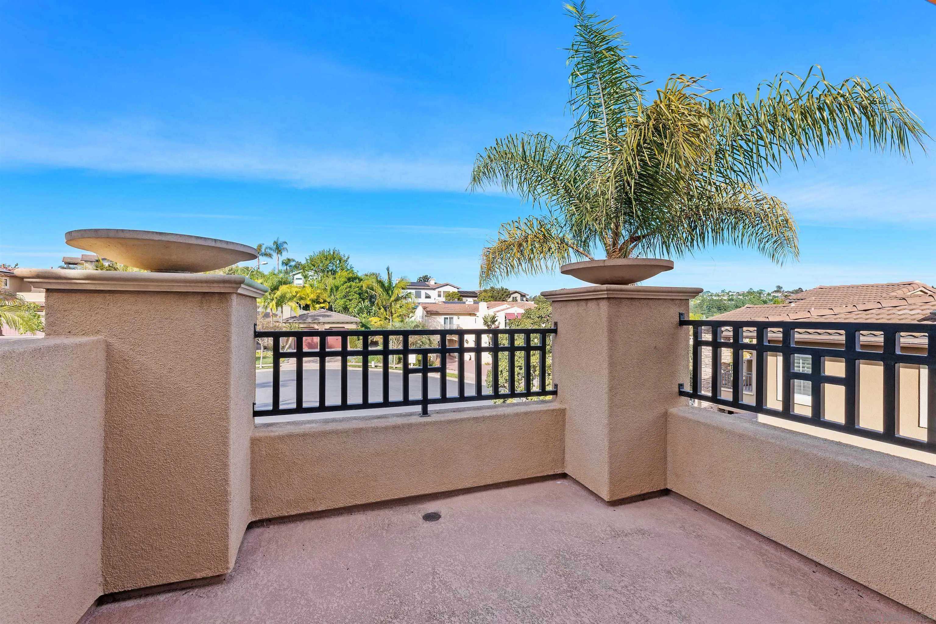 527 Quail Pointe Lane Encinitas, CA 92024 - Photo 34 of 46 a view of a balcony with an outdoor space