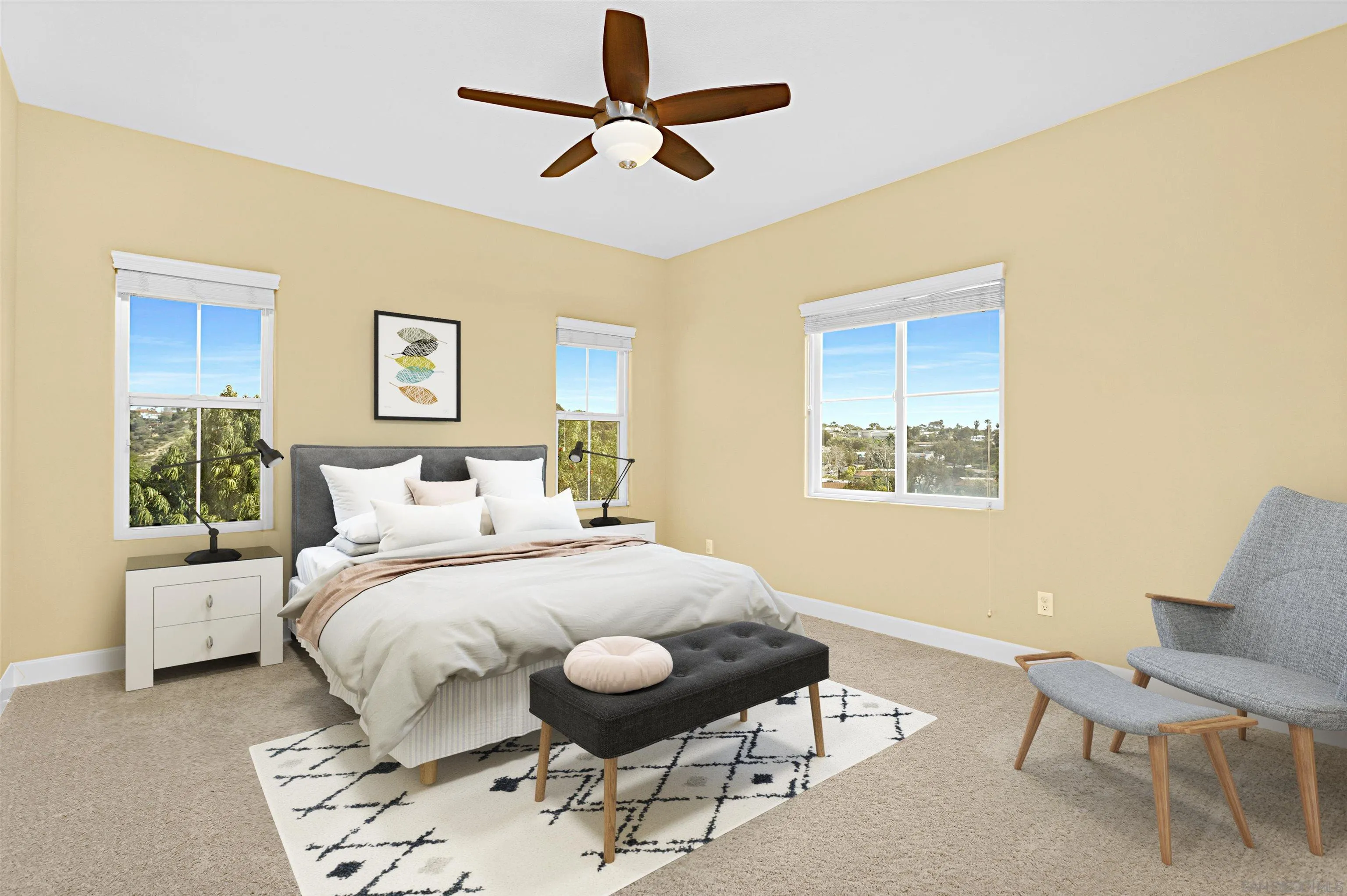 527 Quail Pointe Lane Encinitas, CA 92024 - Photo 36 of 46 a bedroom with a bed and a chair