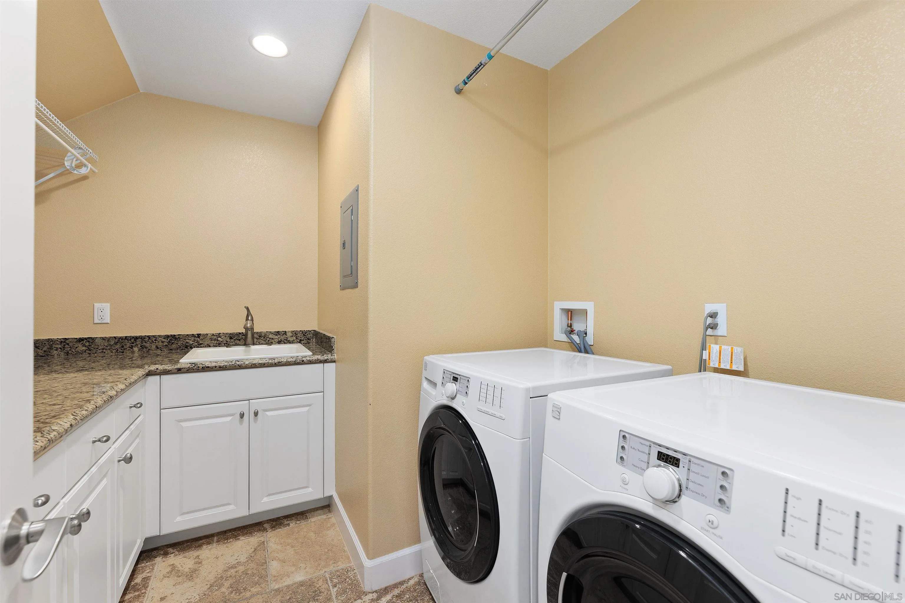 527 Quail Pointe Lane Encinitas, CA 92024 - Photo 38 of 46 a utility room with dryer and washer