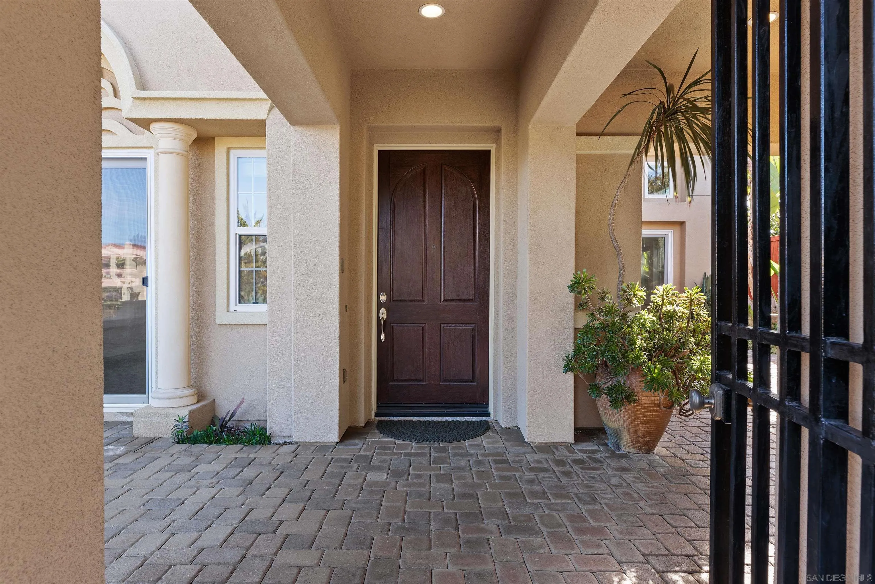 527 Quail Pointe Lane Encinitas, CA 92024 - Photo 6 of 46 a view of a entryway door of the house