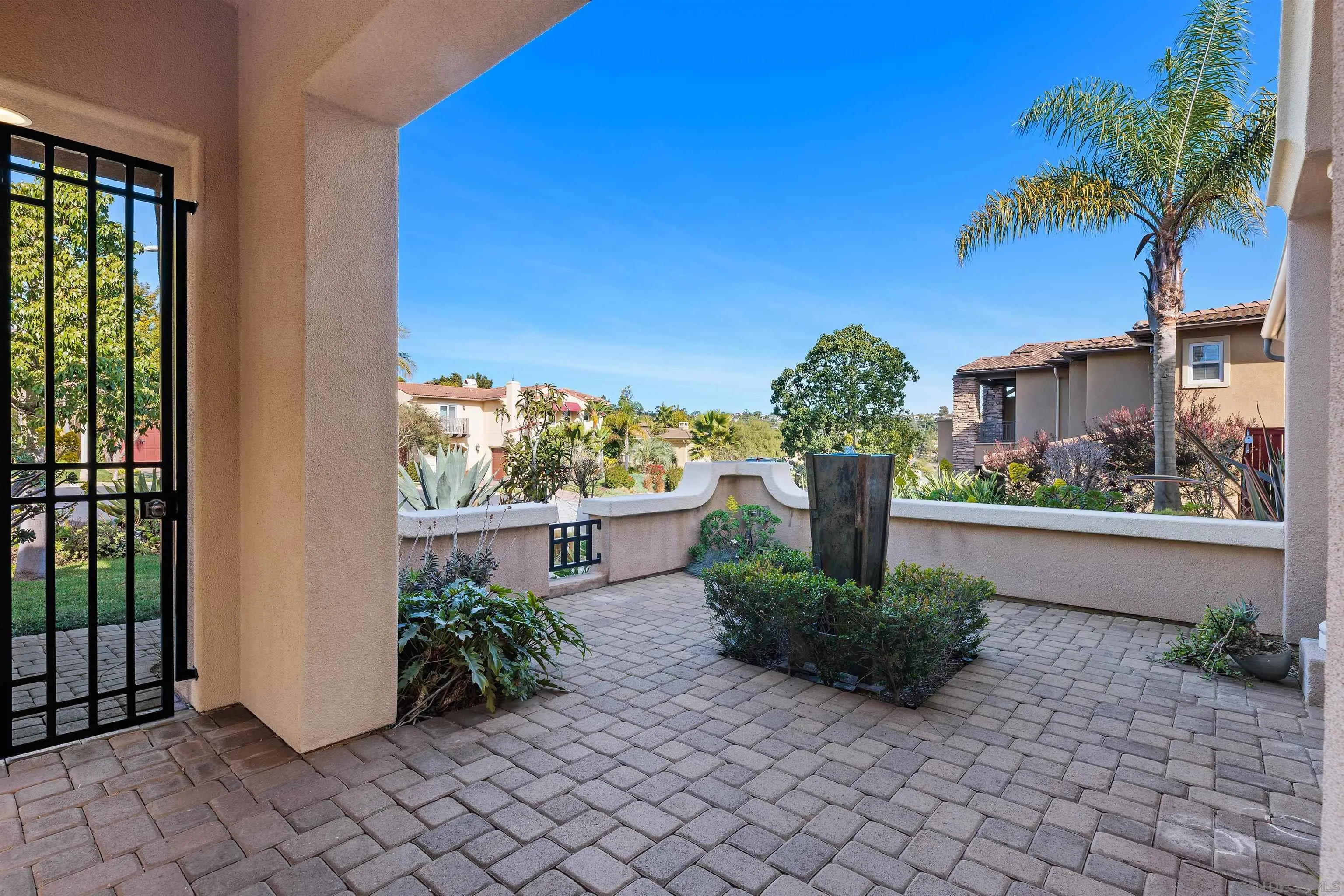 527 Quail Pointe Lane Encinitas, CA 92024 - Photo 7 of 46 a view of a potted plants in backyard of a house