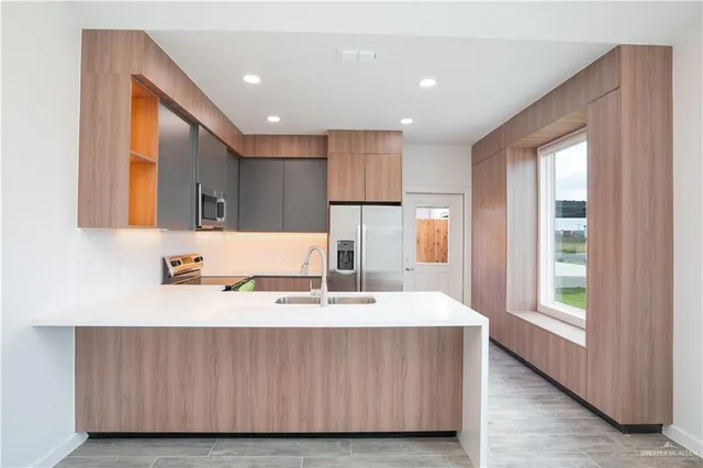 a bathroom with a sink a mirror and a bathtub