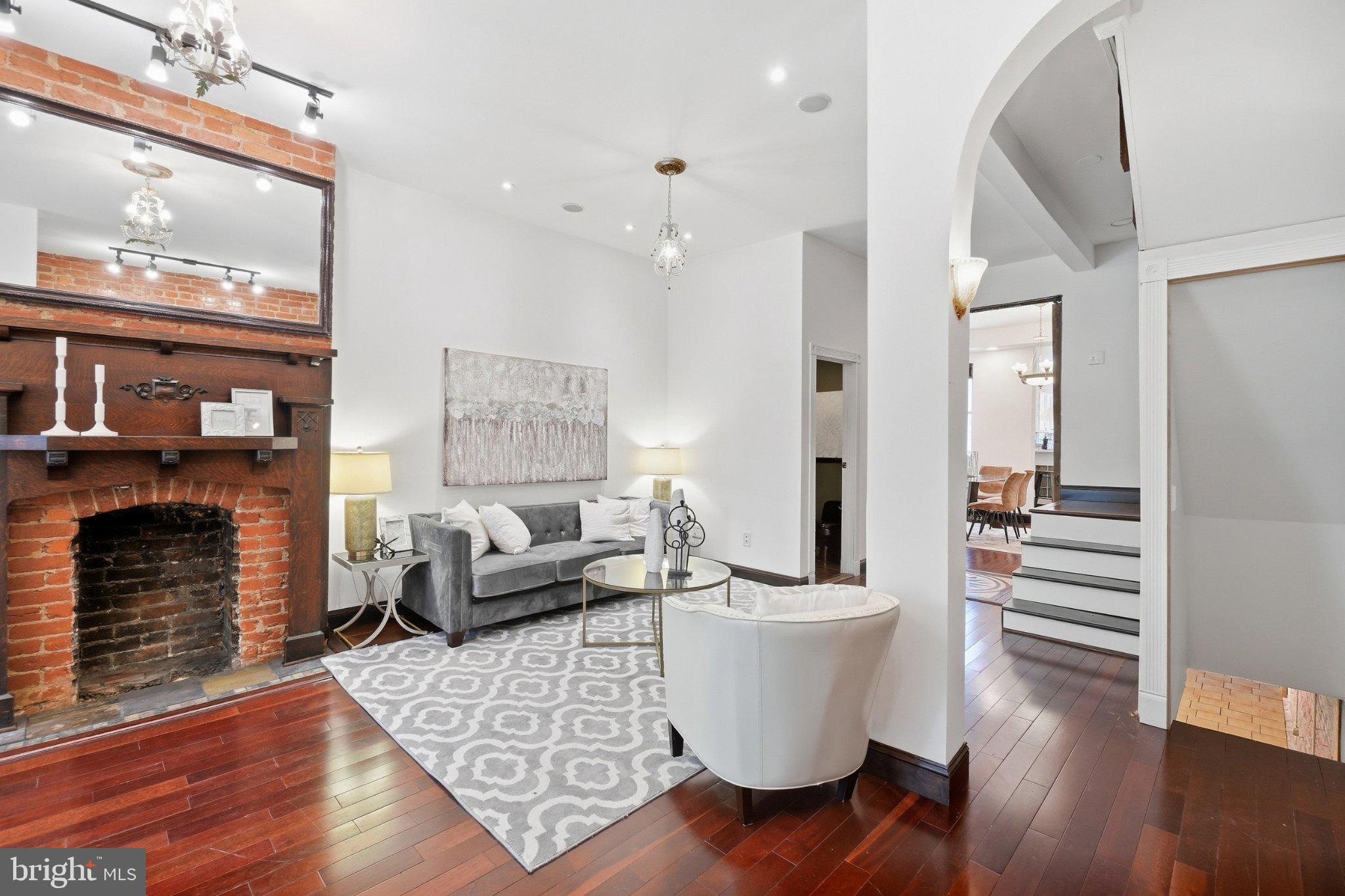 1128 Park Road Northwest Washington, DC 20010 - Photo 3 of 30 Double door entry leads to your main living space.