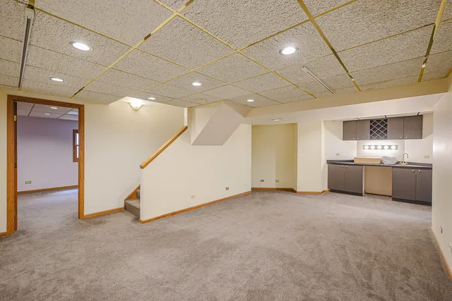 a view of an empty room with a sink