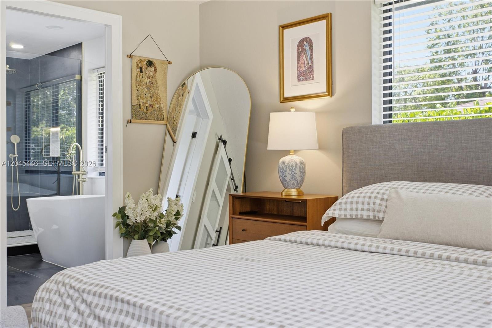 8440 Southwest 180th Street Palmetto Bay, FL 33157 - Photo 24 of 54 a bedroom with a bed and a window