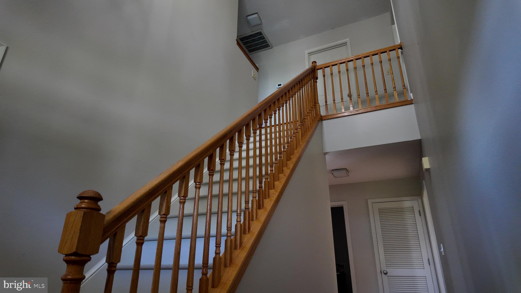1185 Kesler Road Front Royal, VA 22630 - Photo 25 of 51 a view of staircase with lots of frames on wall