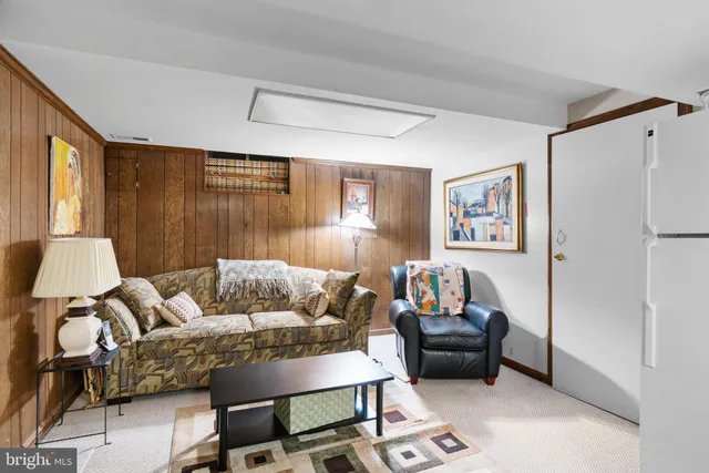 a living room with furniture and a couch