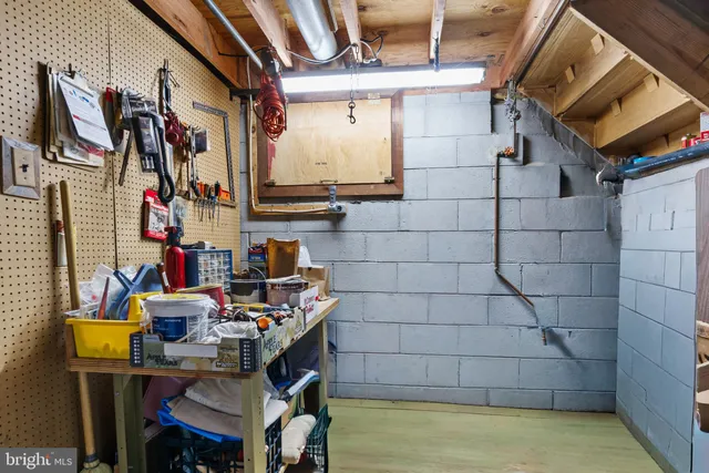 a view of a chairs and table in a backyard