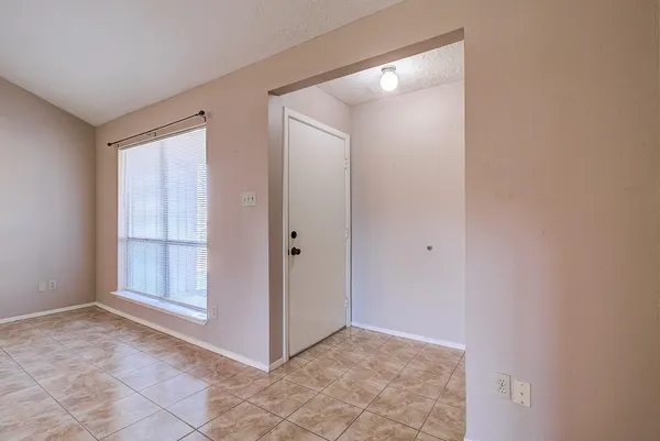 a view of a bathroom with a bathtub