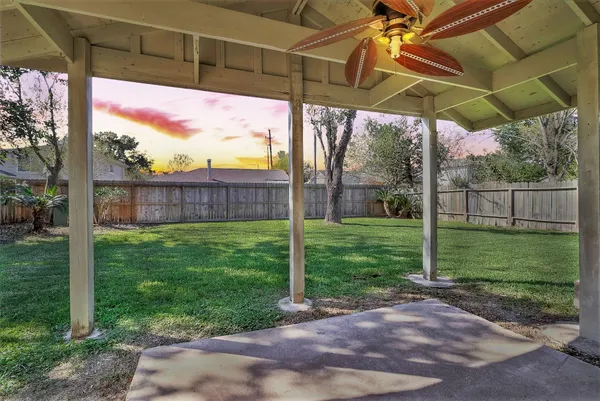 a view of a yard with a porch