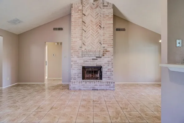 a view of a livingroom with a fireplace