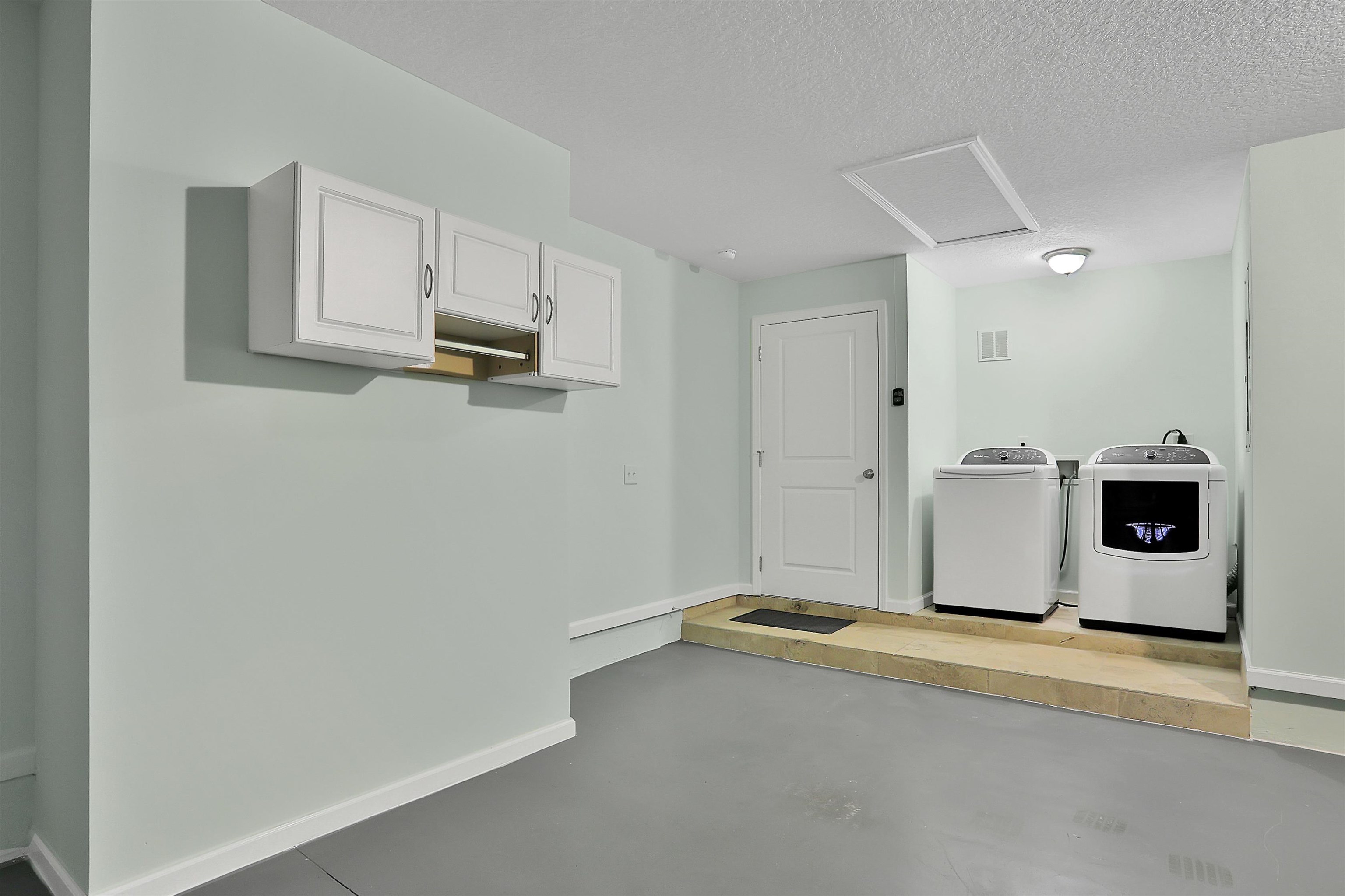 405 Boating Club Road St. Augustine, FL 32084 - Photo 16 of 35 a view of a storage & utility room with a microwave