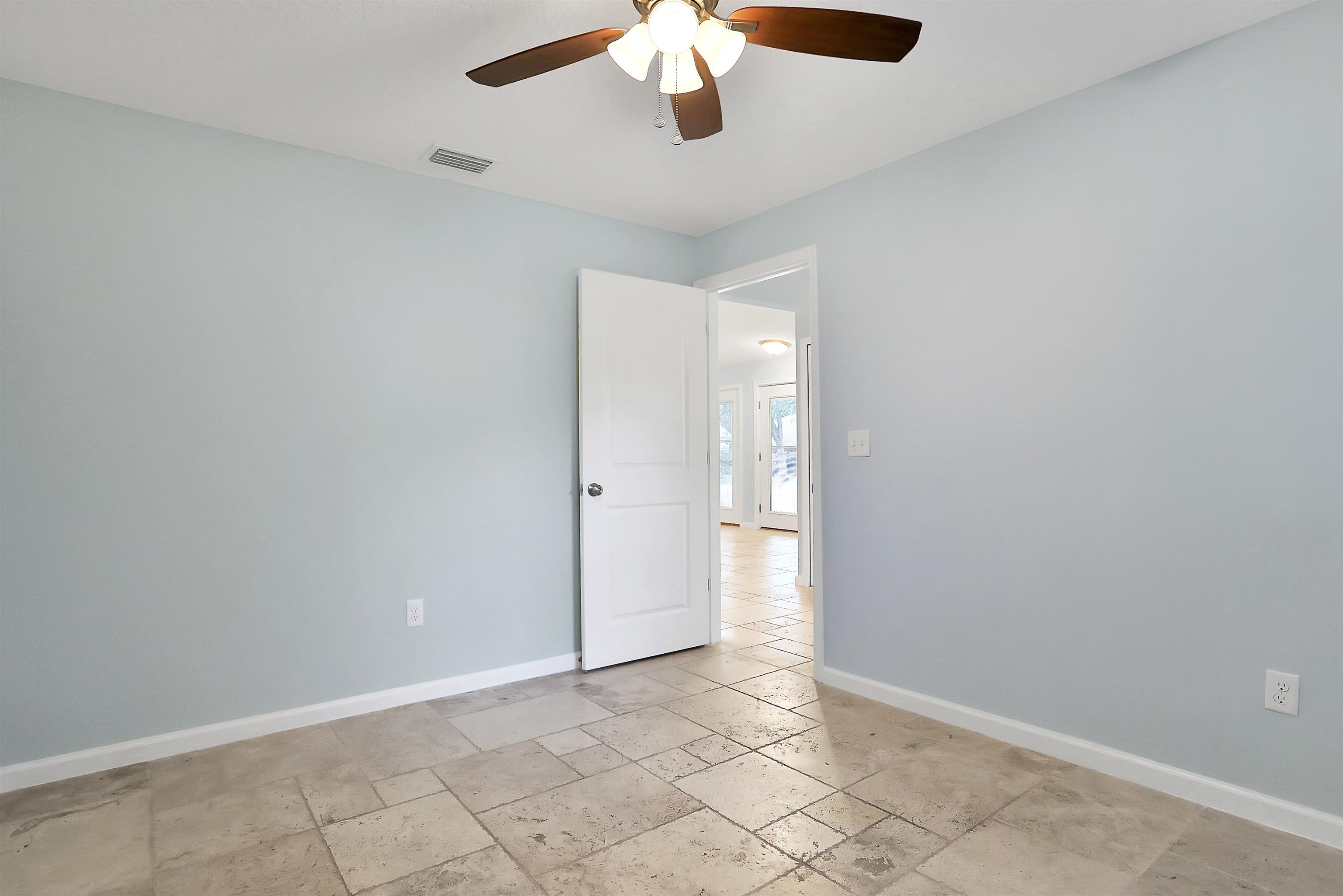 405 Boating Club Road St. Augustine, FL 32084 - Photo 33 of 35 an empty room with chandelier fan