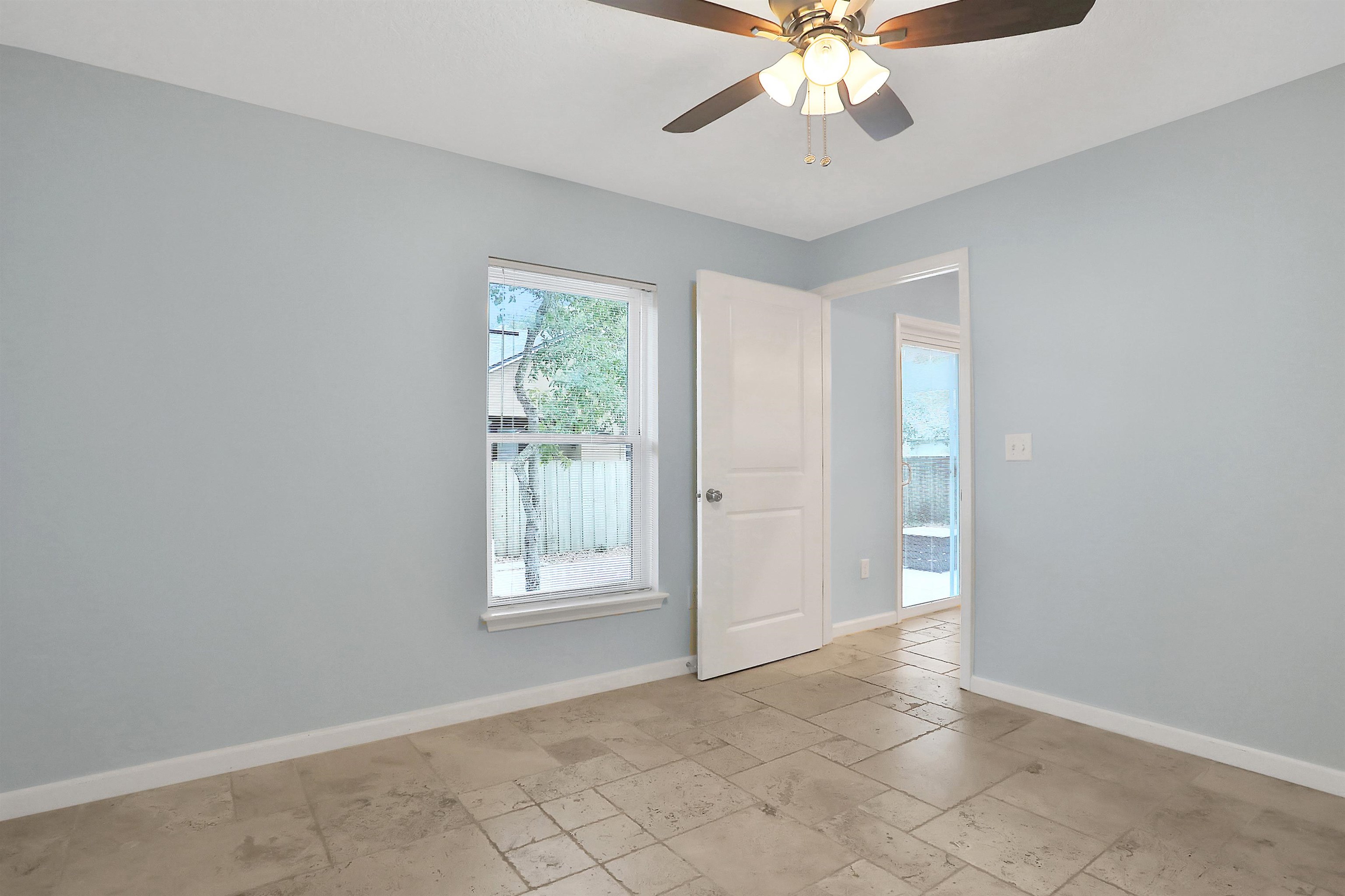 405 Boating Club Road St. Augustine, FL 32084 - Photo 35 of 35 an empty room with fan and windows