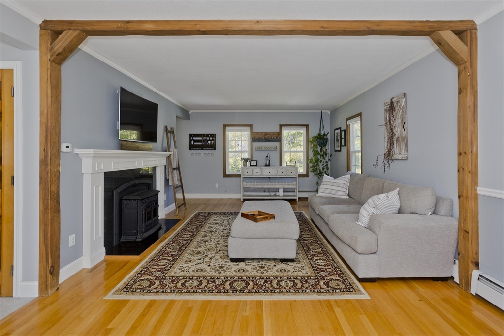 275 NW Road Westhampton, MA 01027 - Photo 11 of 42 a living room with furniture and a fireplace