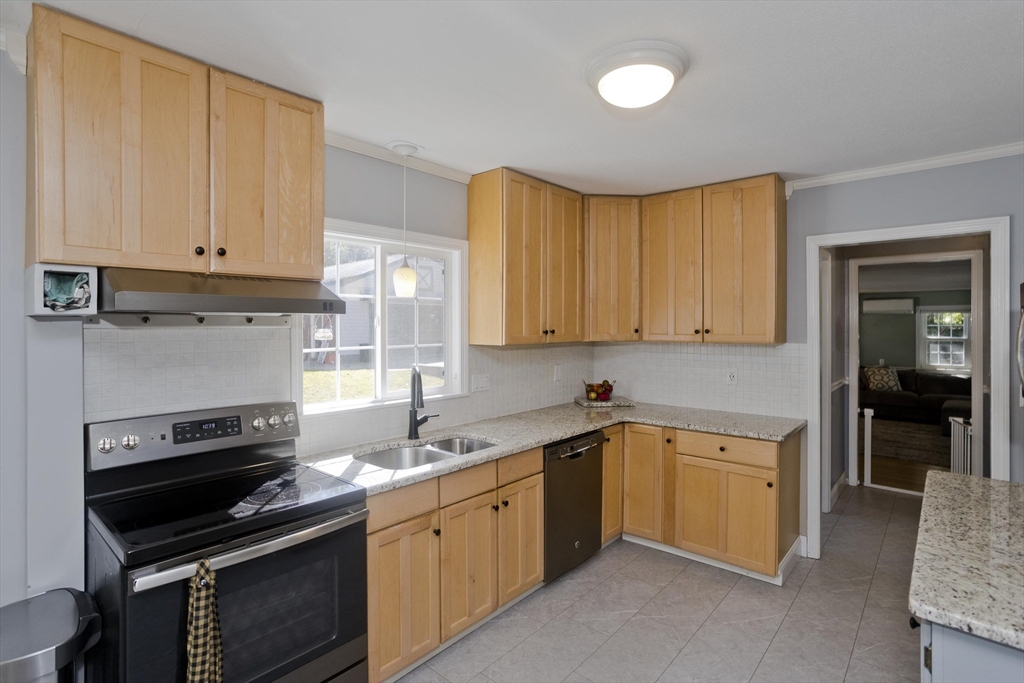 275 NW Road Westhampton, MA 01027 - Photo 15 of 42 a kitchen with a sink stove and cabinets