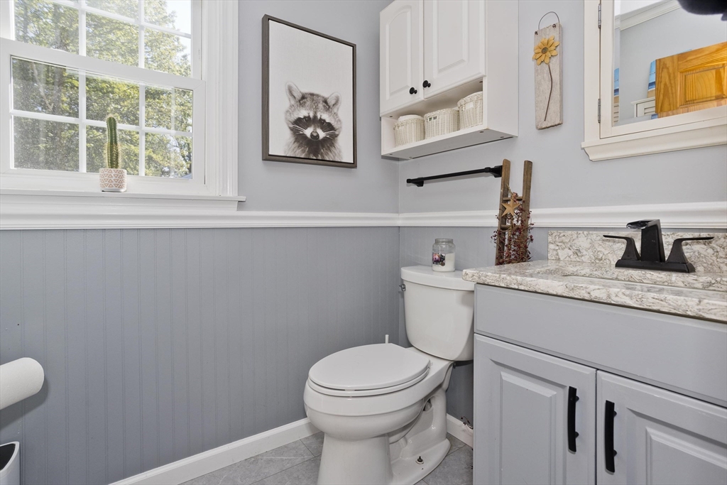 275 NW Road Westhampton, MA 01027 - Photo 17 of 42 a bathroom with a toilet a sink and a window