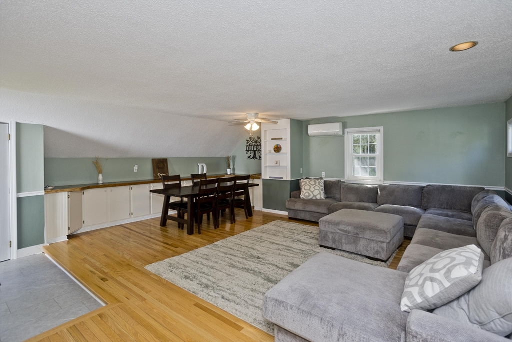 275 NW Road Westhampton, MA 01027 - Photo 5 of 42 a living room with furniture and a table