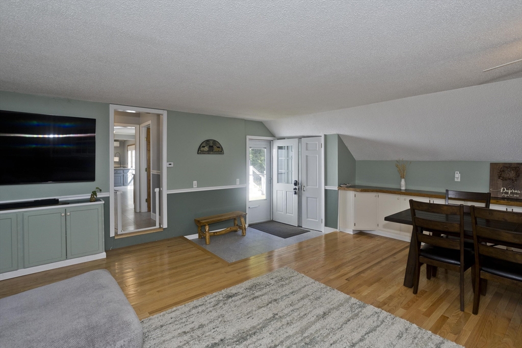 275 NW Road Westhampton, MA 01027 - Photo 7 of 42 a living room with furniture and a flat screen tv