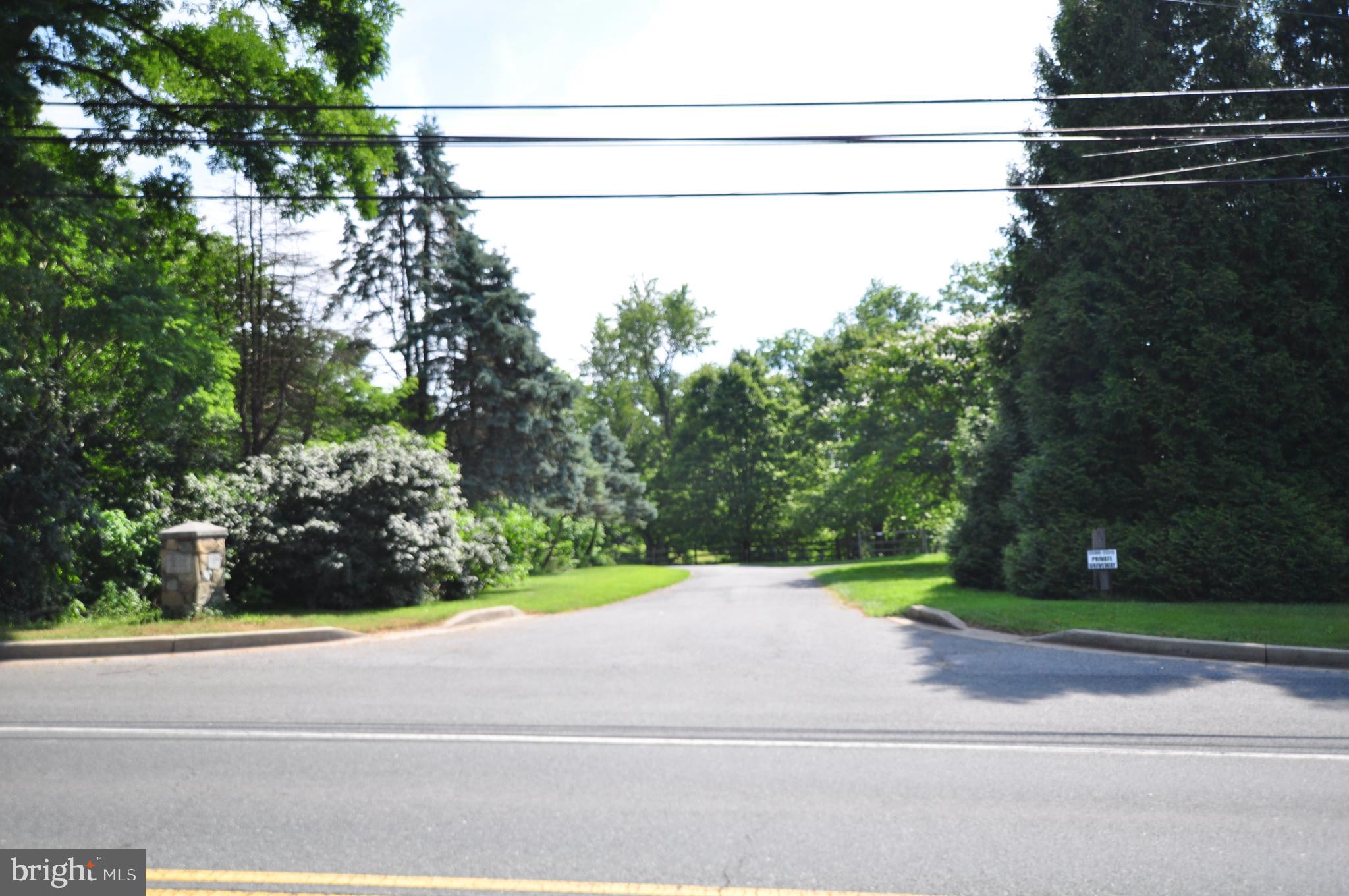 23309 Woodfield Road Gaithersburg, MD 20882 - Photo 2 of 69 Private Driveway Entrance
