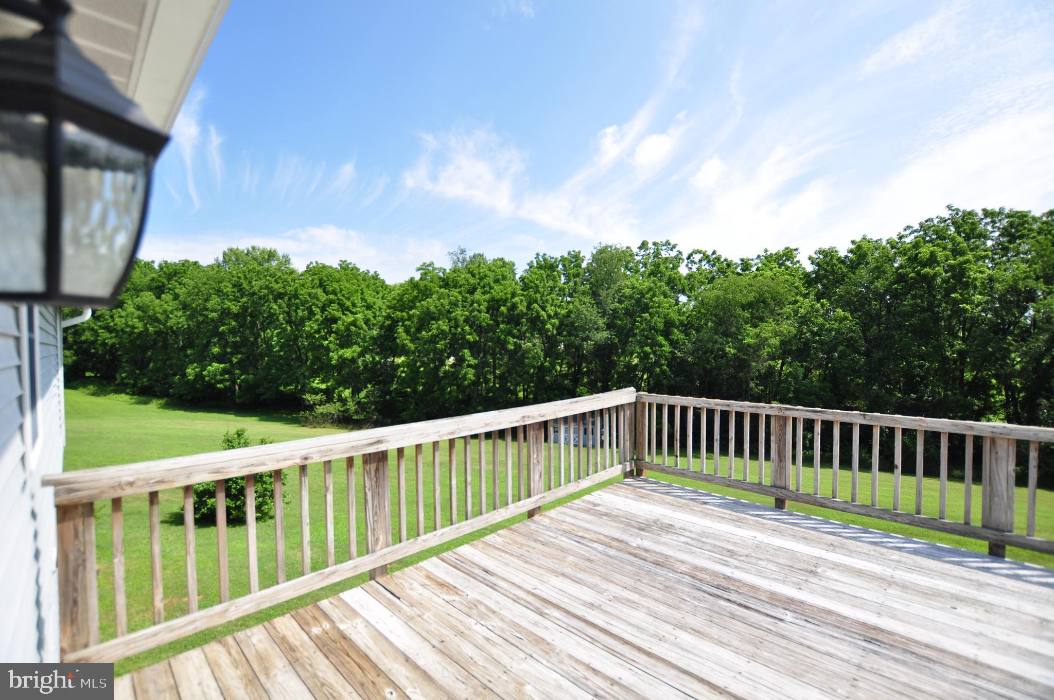 23309 Woodfield Road Gaithersburg, MD 20882 - Photo 29 of 69 Deck Off Kitchen