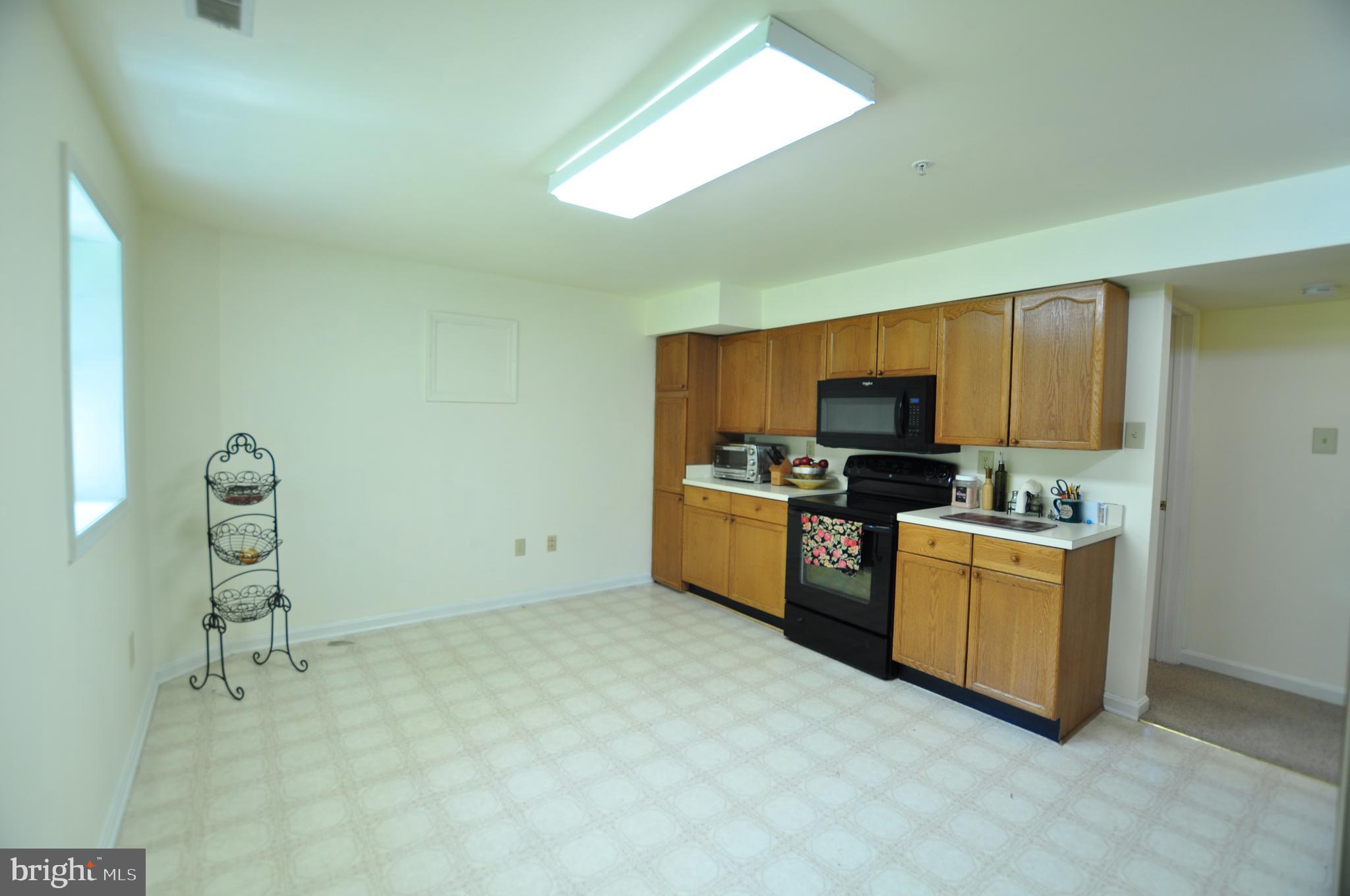 23309 Woodfield Road Gaithersburg, MD 20882 - Photo 64 of 69 Basement Kitchen
