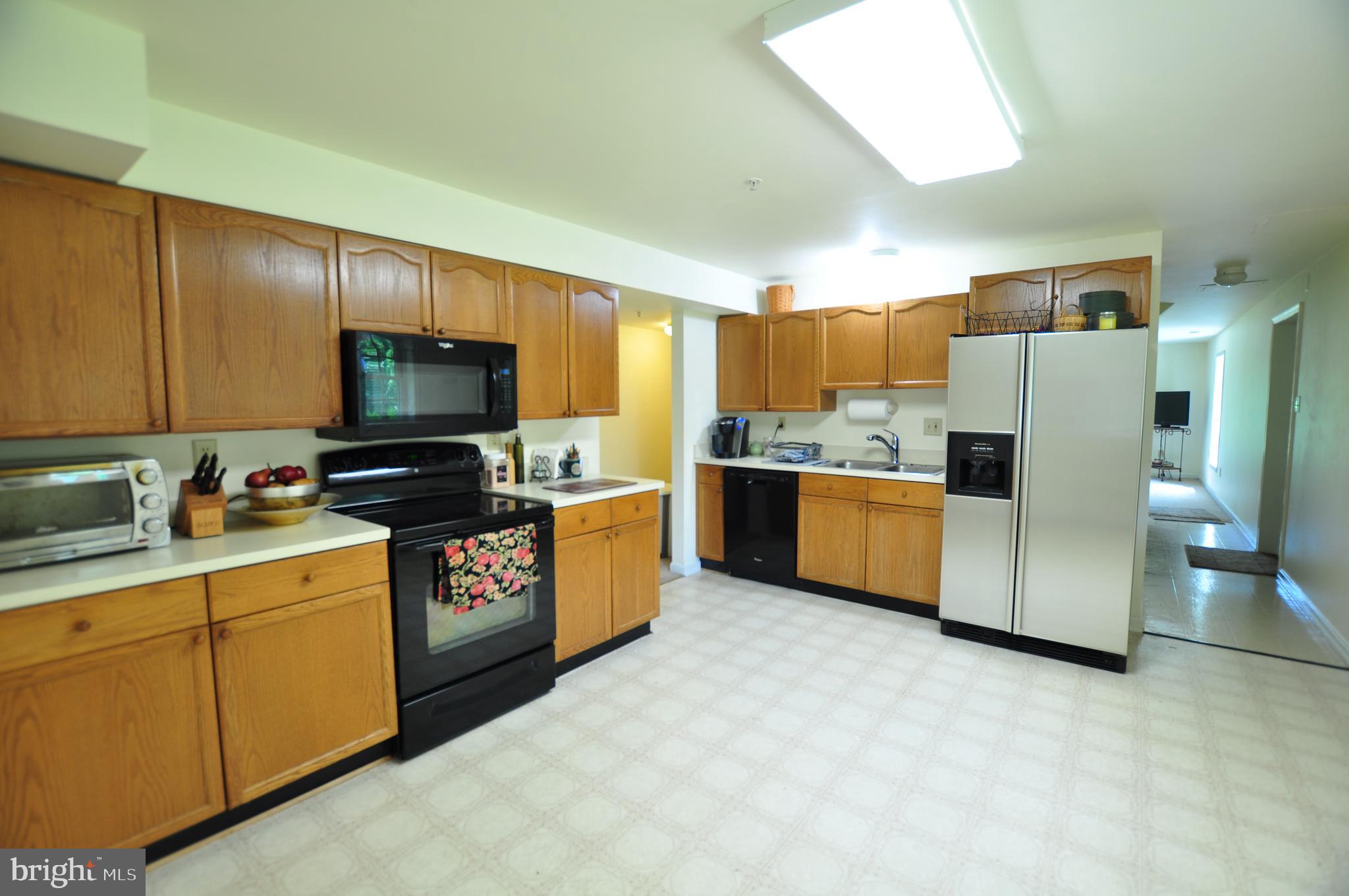 23309 Woodfield Road Gaithersburg, MD 20882 - Photo 65 of 69 Basement Kitchen