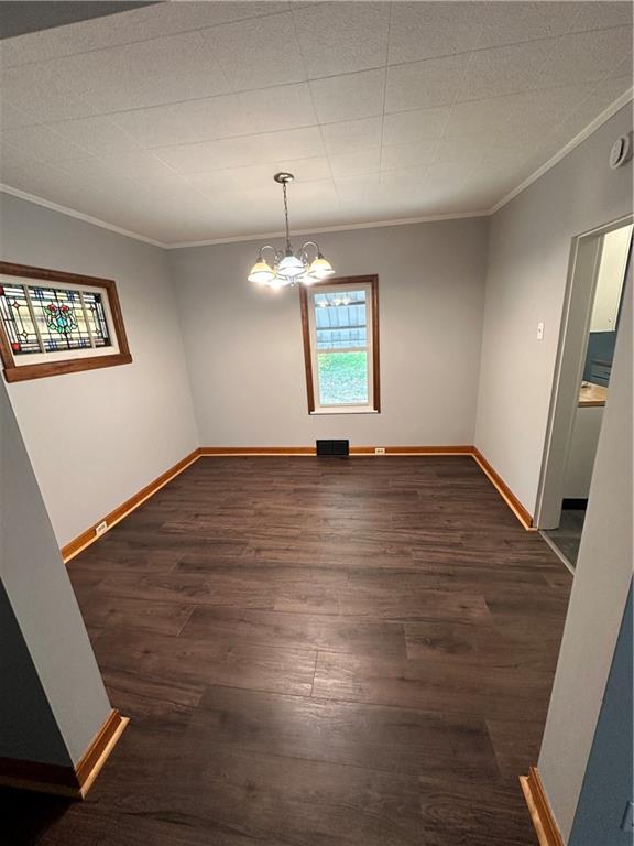 1418 Beckham Street Pittsburgh, PA 15212 - Photo 15 of 22 an empty room with wooden floor and windows