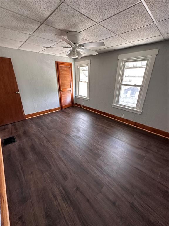 1418 Beckham Street Pittsburgh, PA 15212 - Photo 5 of 22 an empty room with wooden floor and windows