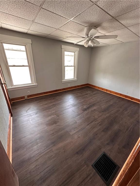 1418 Beckham Street Pittsburgh, PA 15212 - Photo 6 of 22 an empty room with wooden floor and windows