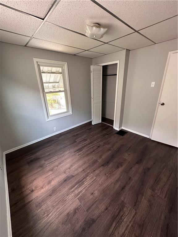 1418 Beckham Street Pittsburgh, PA 15212 - Photo 9 of 22 a view of an empty room with wooden floor and a window