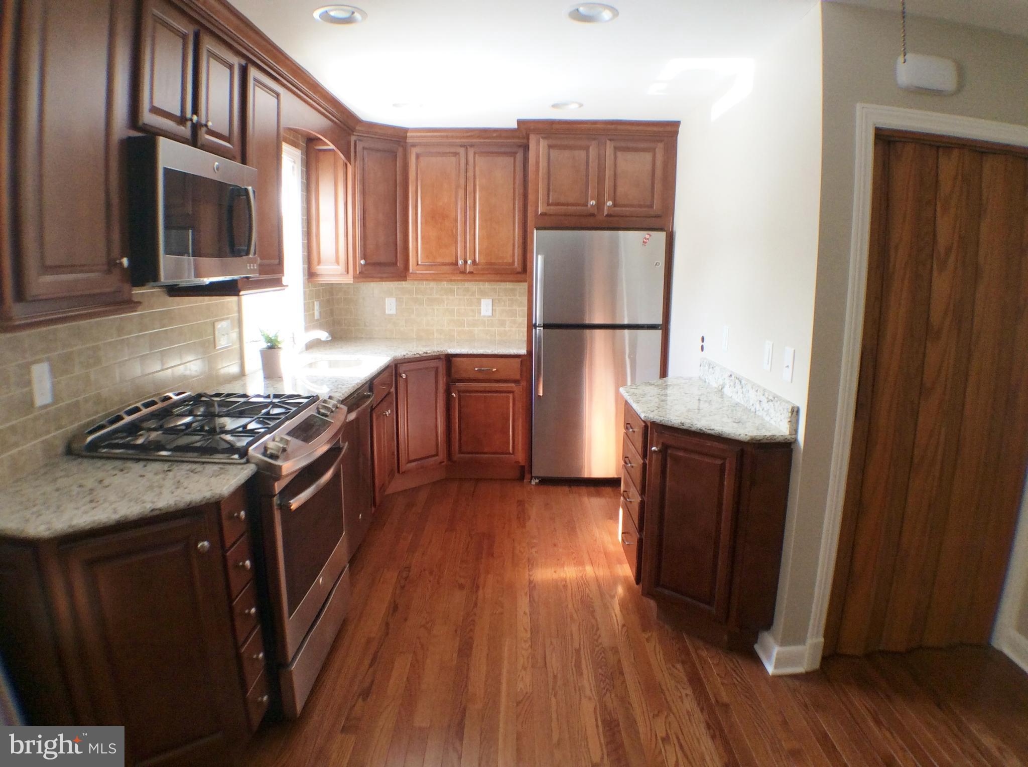 3329 Acton Road Baltimore, MD 21234 - Photo 4 of 20 Kitchen with hardwoods