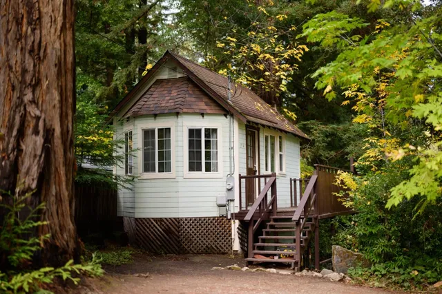 a front view of a house with stairs