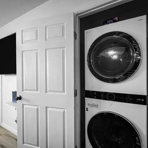 a utility room with dryer and washer