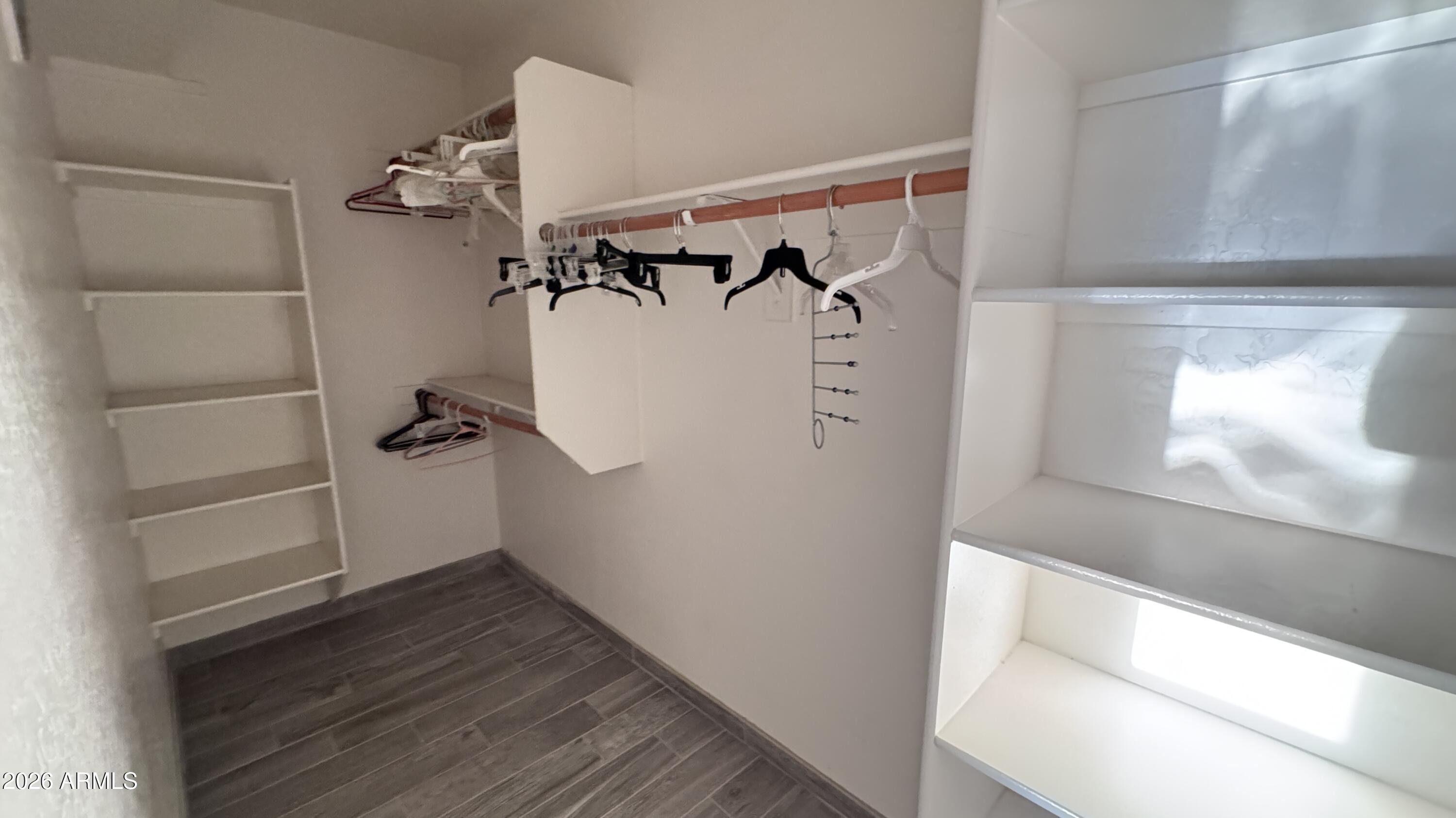 3640 North Prospectors Road Apache Junction, AZ 85119 - Photo 12 of 17 a view of walk in closet with empty racks