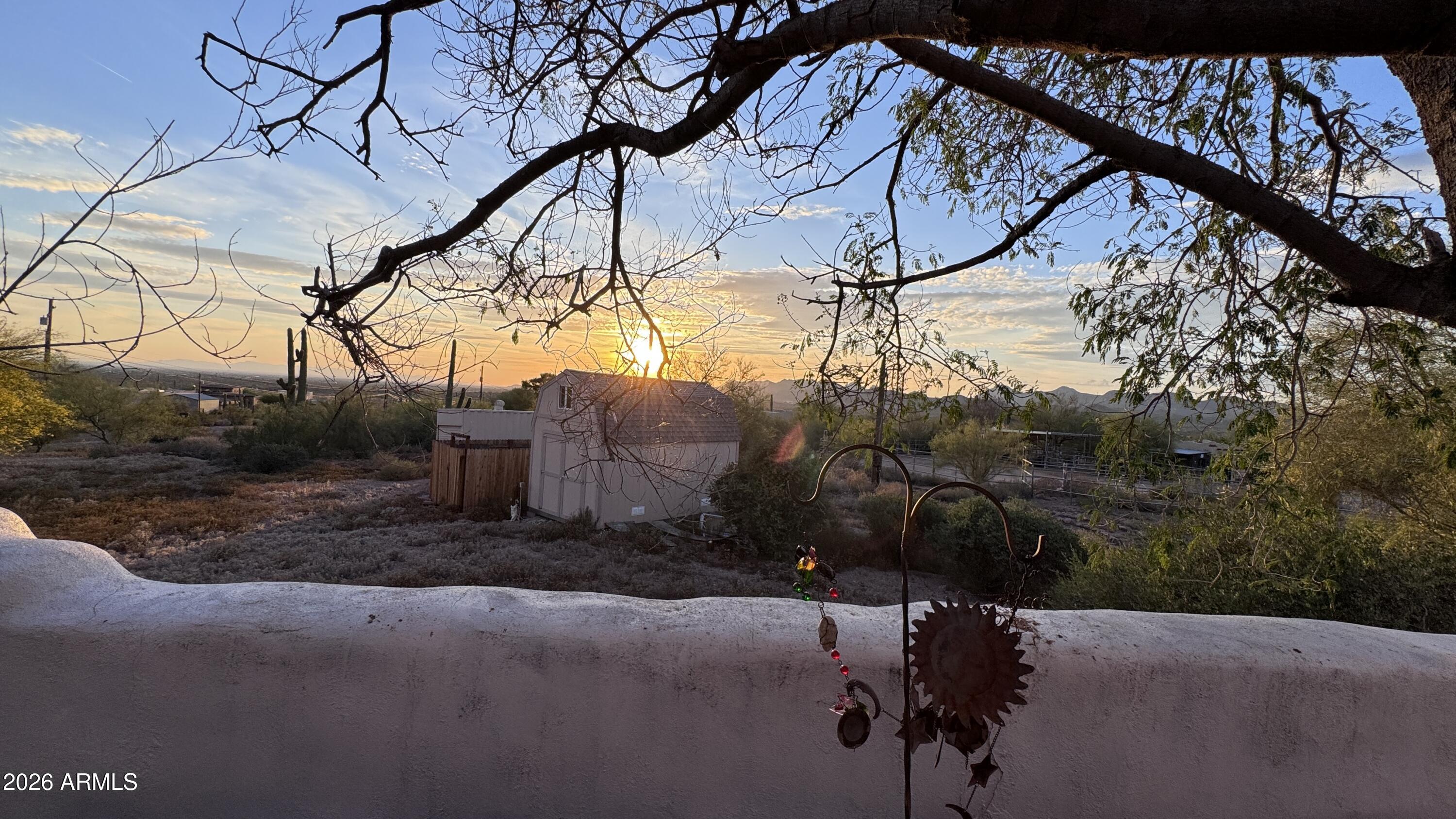 3640 North Prospectors Road Apache Junction, AZ 85119 - Photo 3 of 17 a backyard of a house with lots of green space