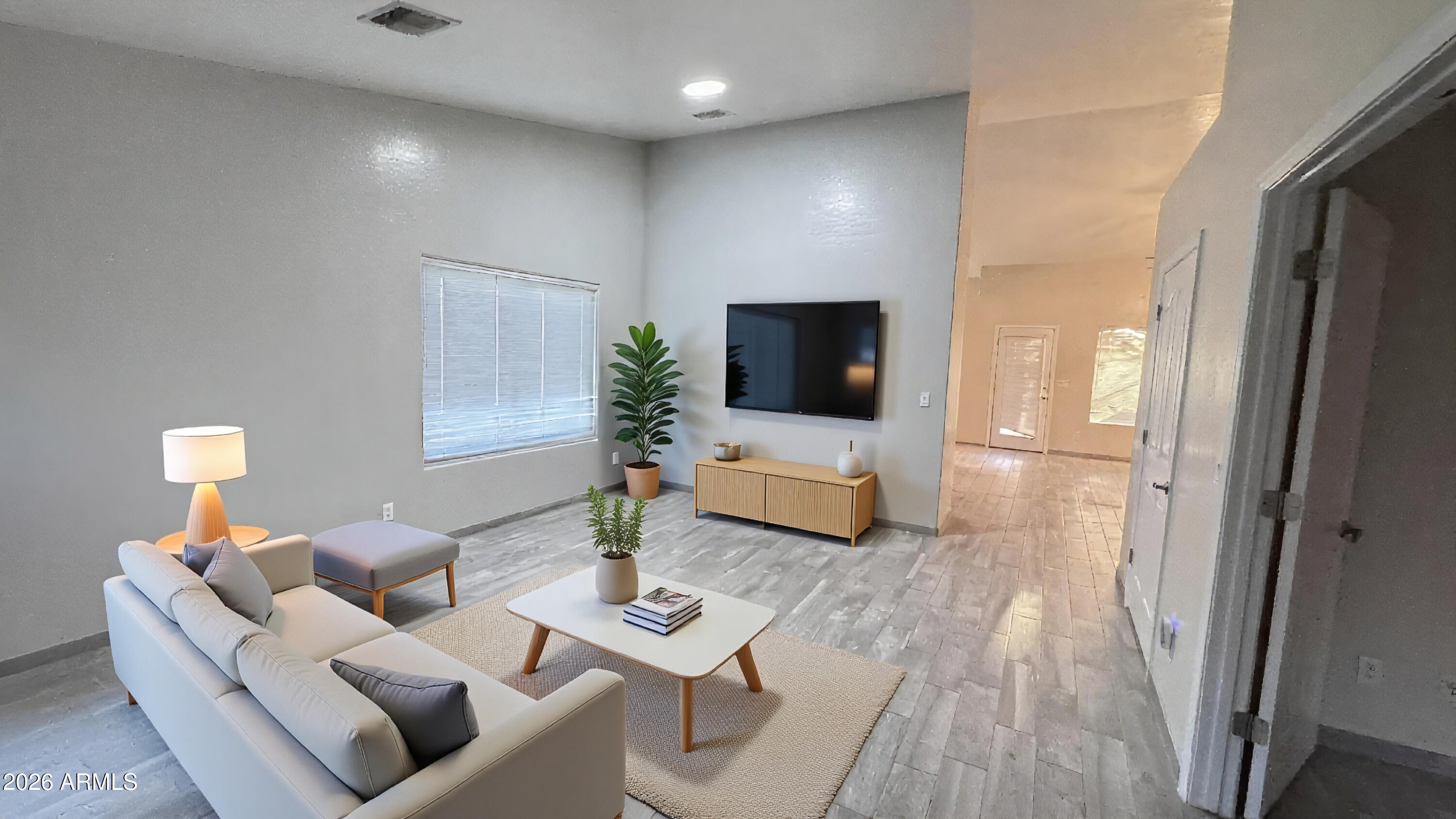 3640 North Prospectors Road Apache Junction, AZ 85119 - Photo 6 of 17 a living room with furniture and a flat screen tv