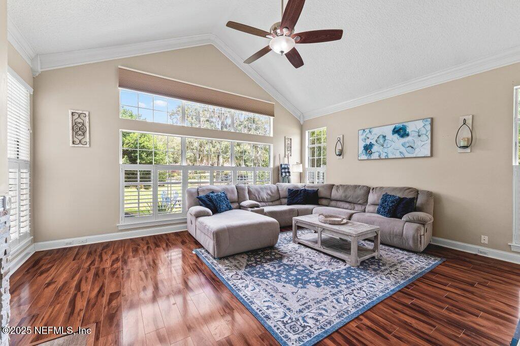 729 Cherry Grove Road Orange Park, FL 32073 - Photo 13 of 34 a living room with furniture and a rug