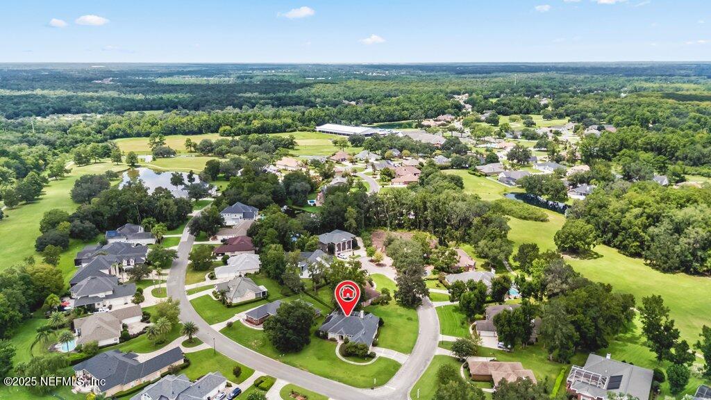 729 Cherry Grove Road Orange Park, FL 32073 - Photo 3 of 34 an aerial view of residential houses with outdoor space and swimming pool