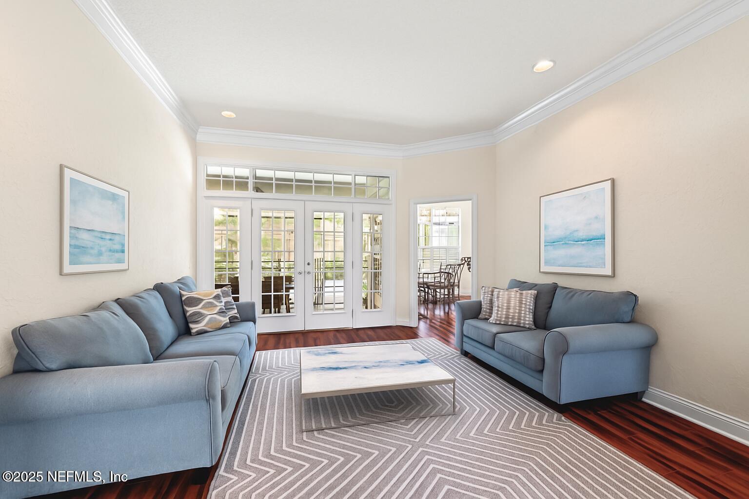 729 Cherry Grove Road Orange Park, FL 32073 - Photo 5 of 34 a living room with furniture and a large window
