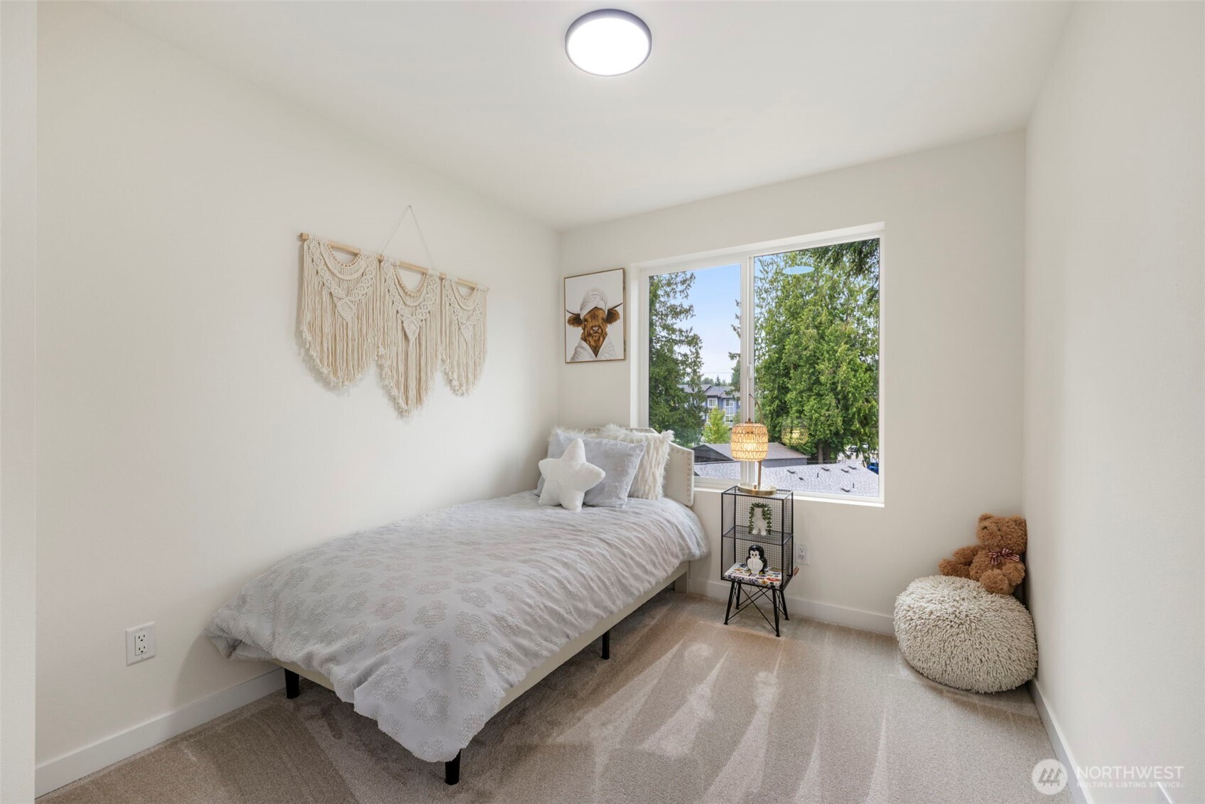 19505 Damson Road, Unit C2 Lynnwood, WA 98036 - Photo 9 of 13 a bedroom with a bed and a window