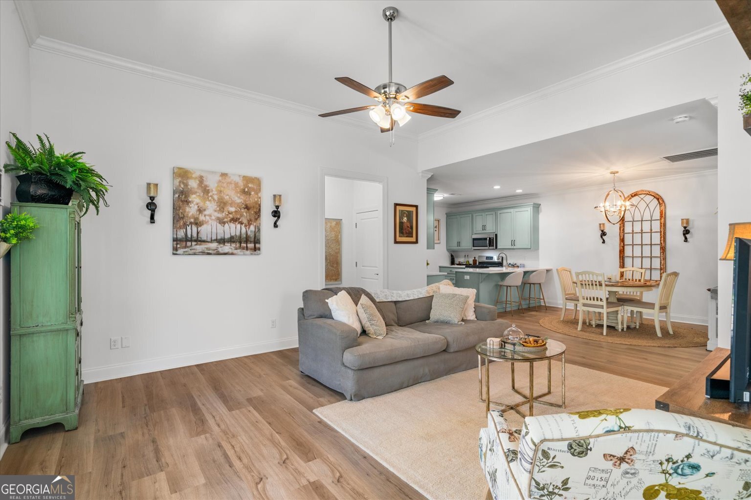 383 Pacer Lane, Unit 3 Dalton, GA 30721 - Photo 6 of 50 a living room with furniture and a wooden floor