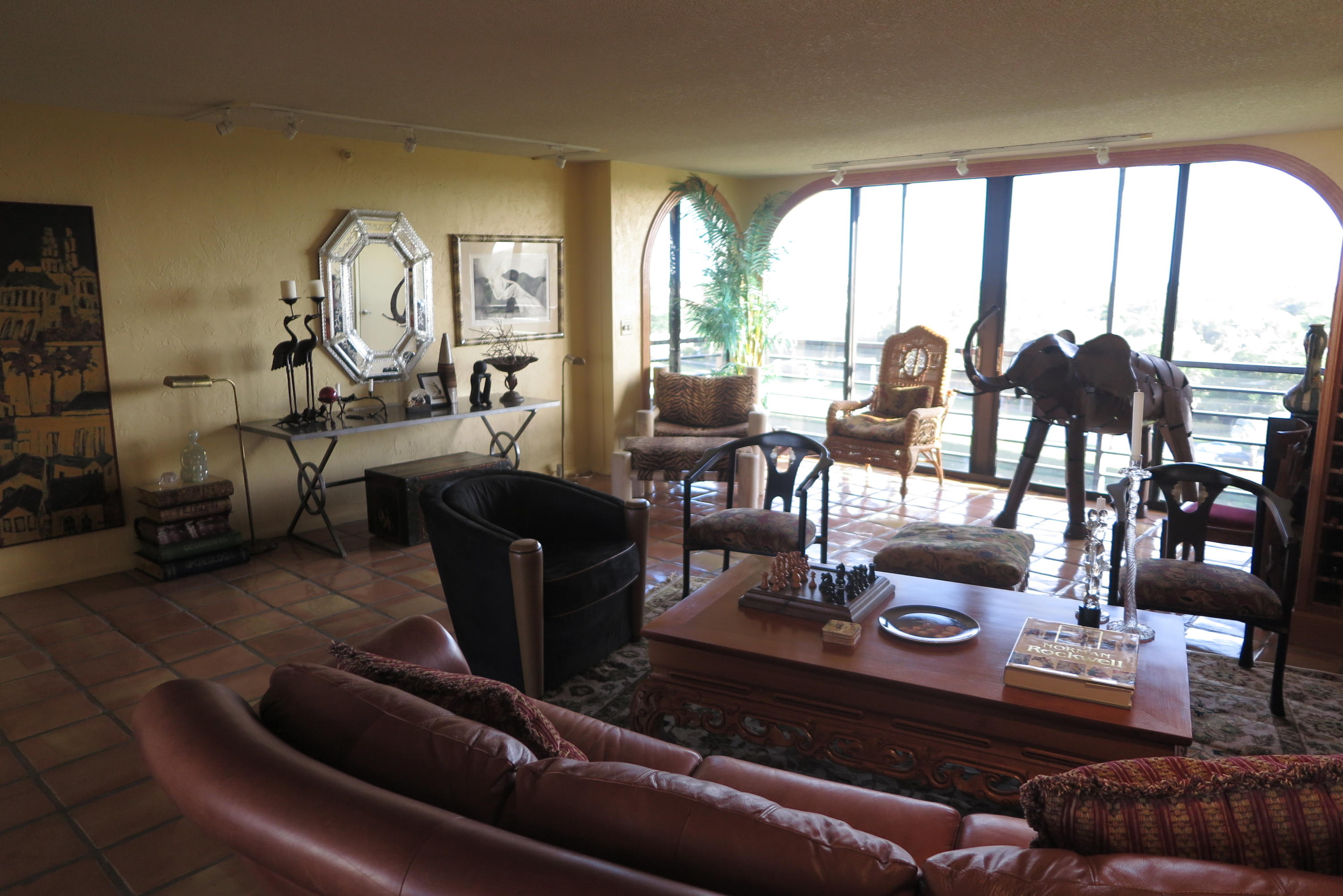 7186 Promenade Drive, Unit 801 Boca Raton, FL 33433 - Photo 9 of 21 a living room with furniture and a large window