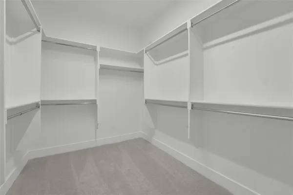 a view of an empty walk in closet