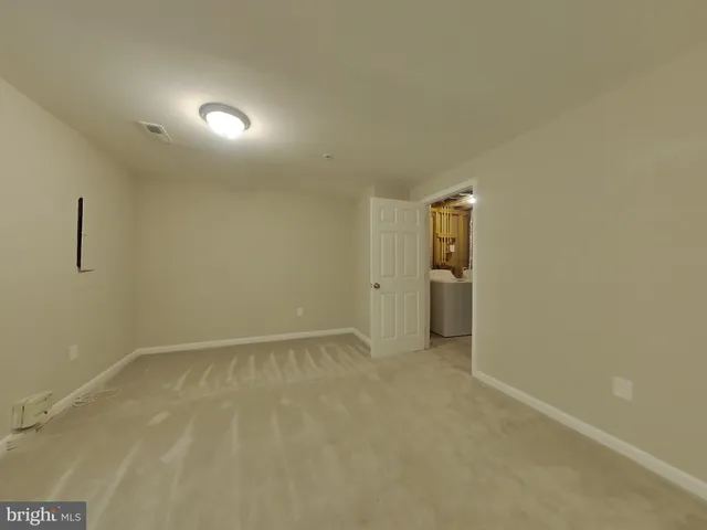 an empty room with an entryway