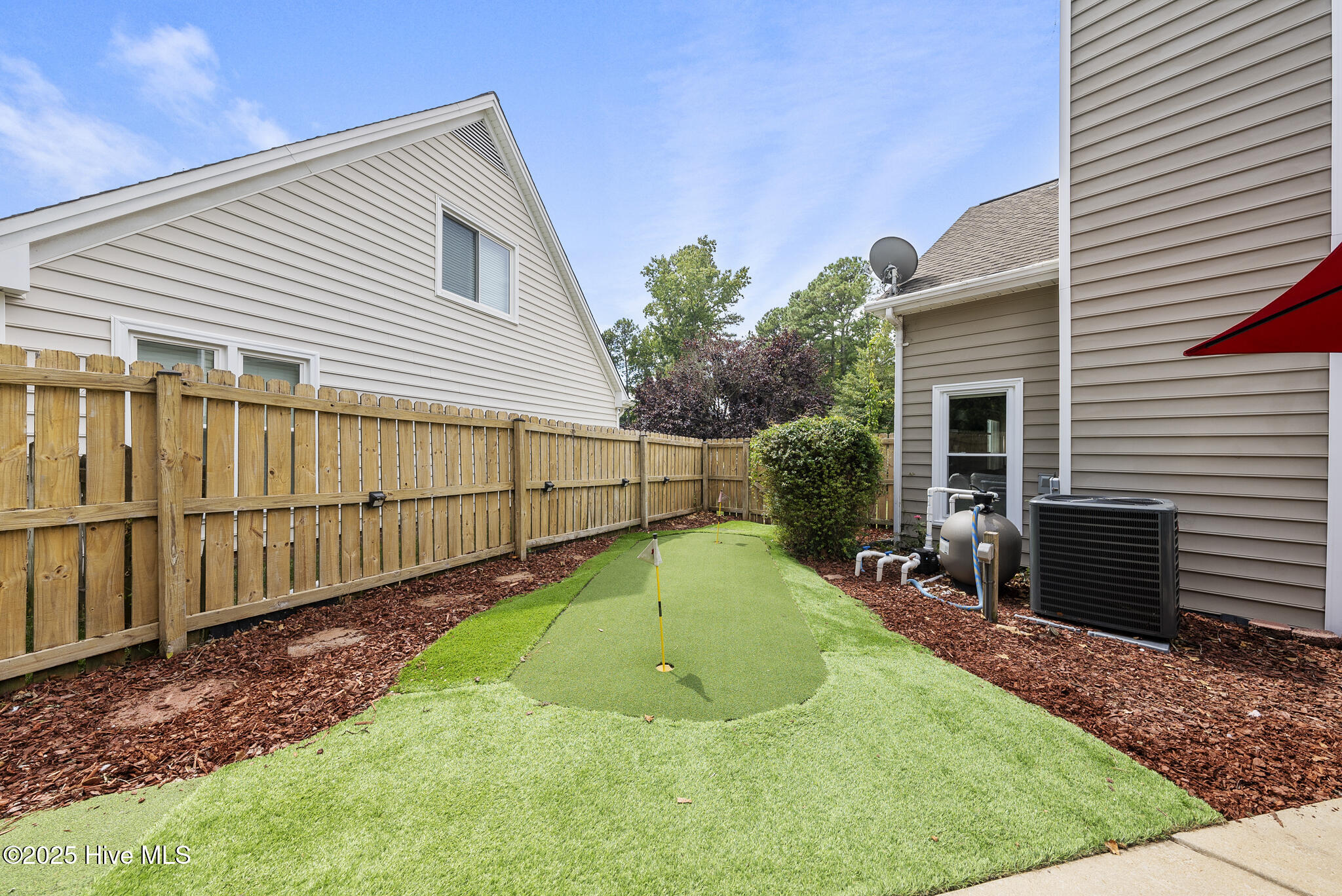 12200 Inglehurst Drive Raleigh, NC 27613 - Photo 34 of 53 Backyard | Putting Green
